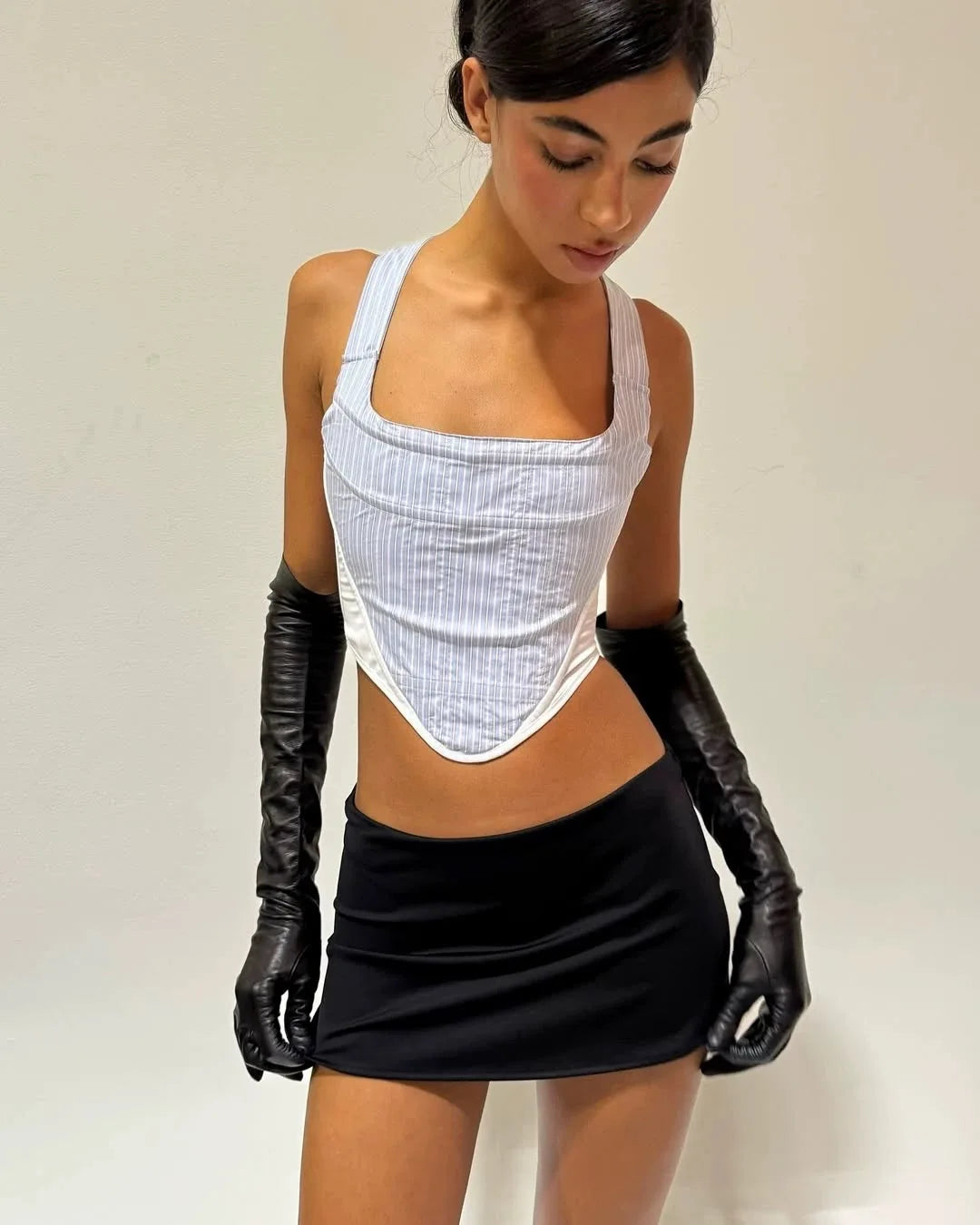 Guizio low-waist elasticized midriff-baring skirt