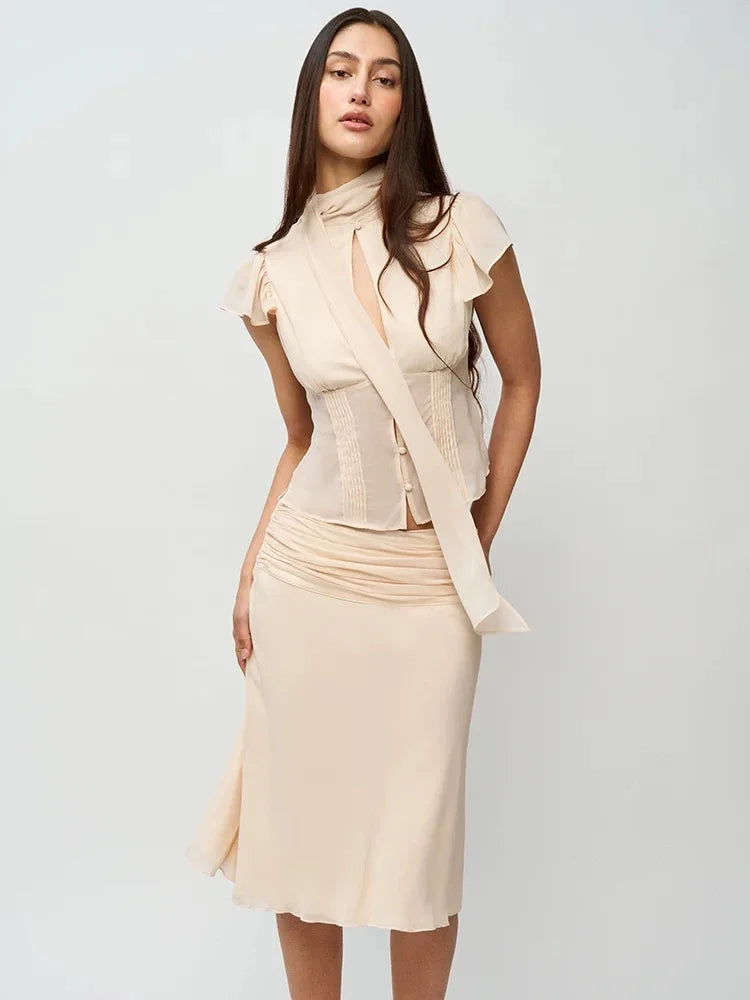 Beck single-button hollowed-out ribbon cardigan top & skirt