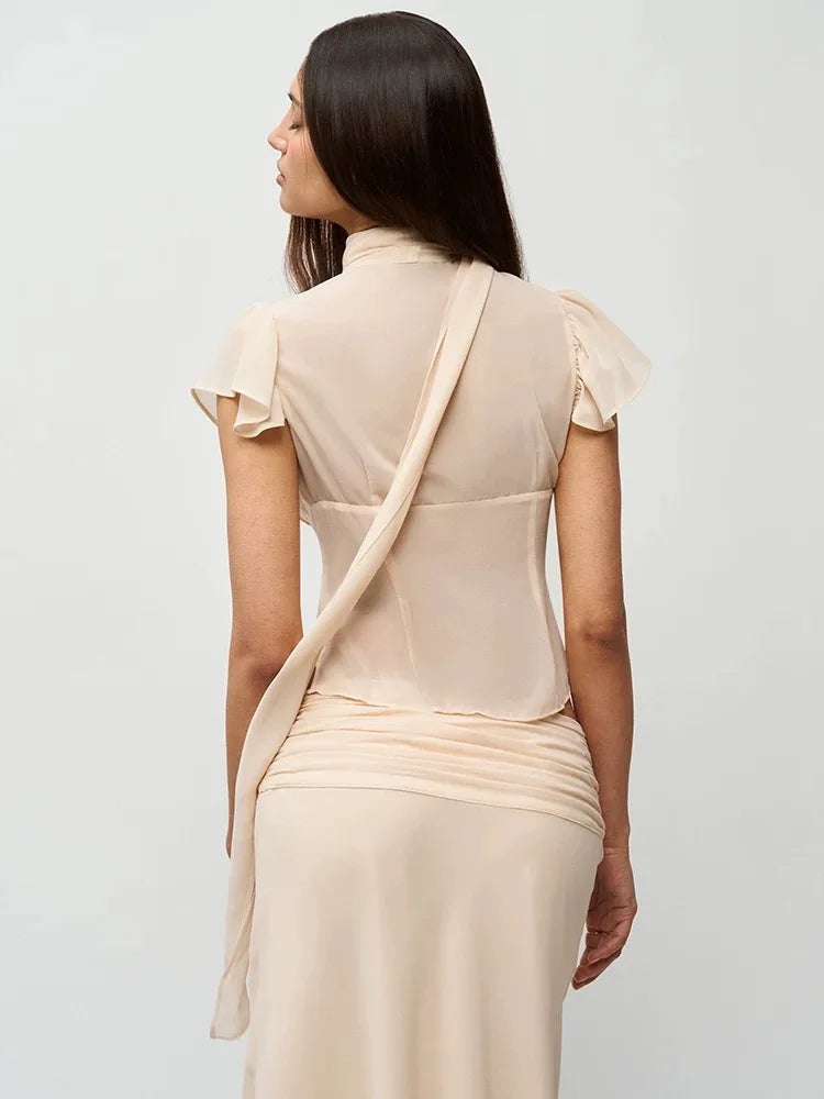 Beck single-button hollowed-out ribbon cardigan top & skirt